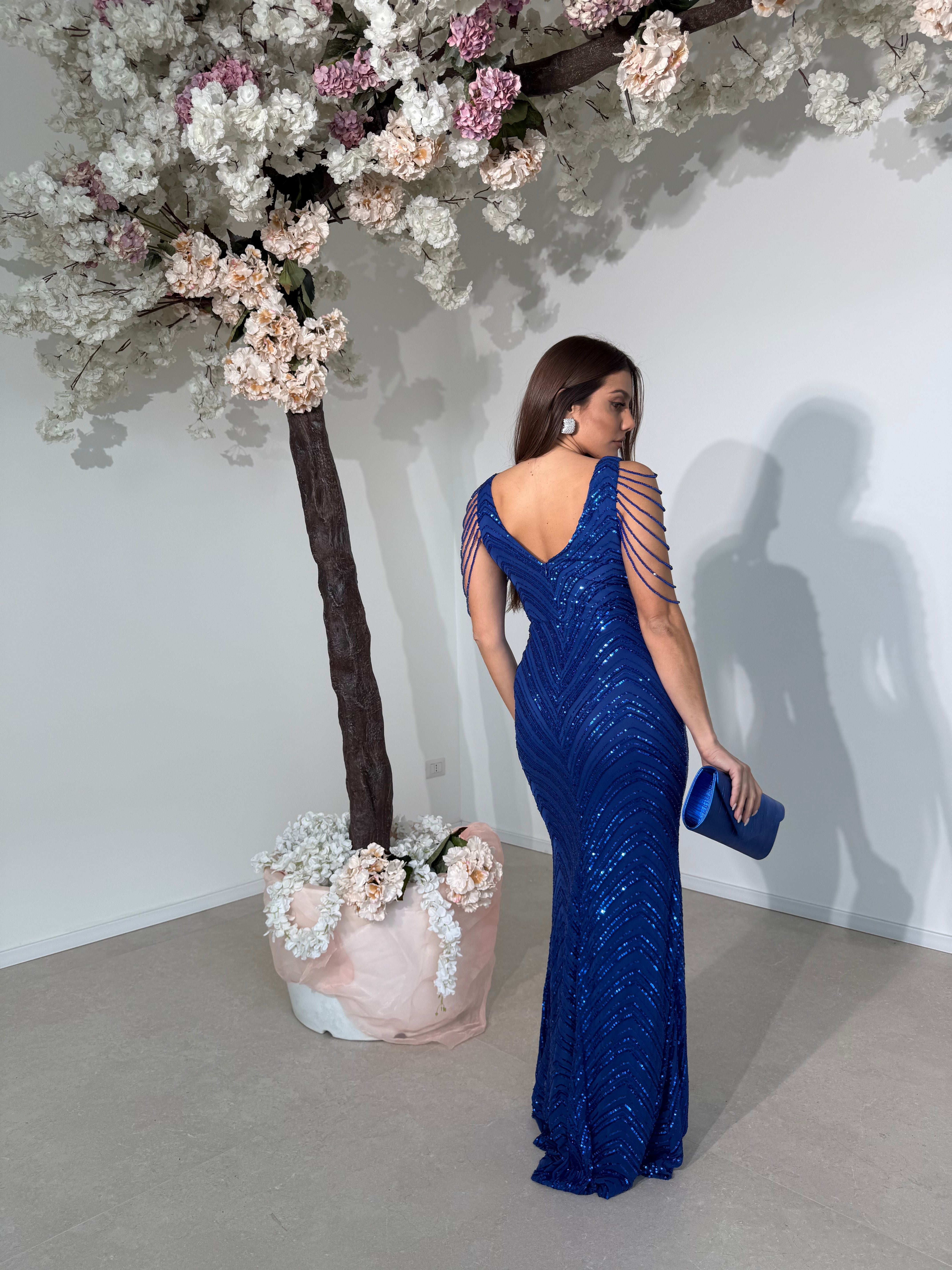 Abito cerimonia con perline sulle braccia