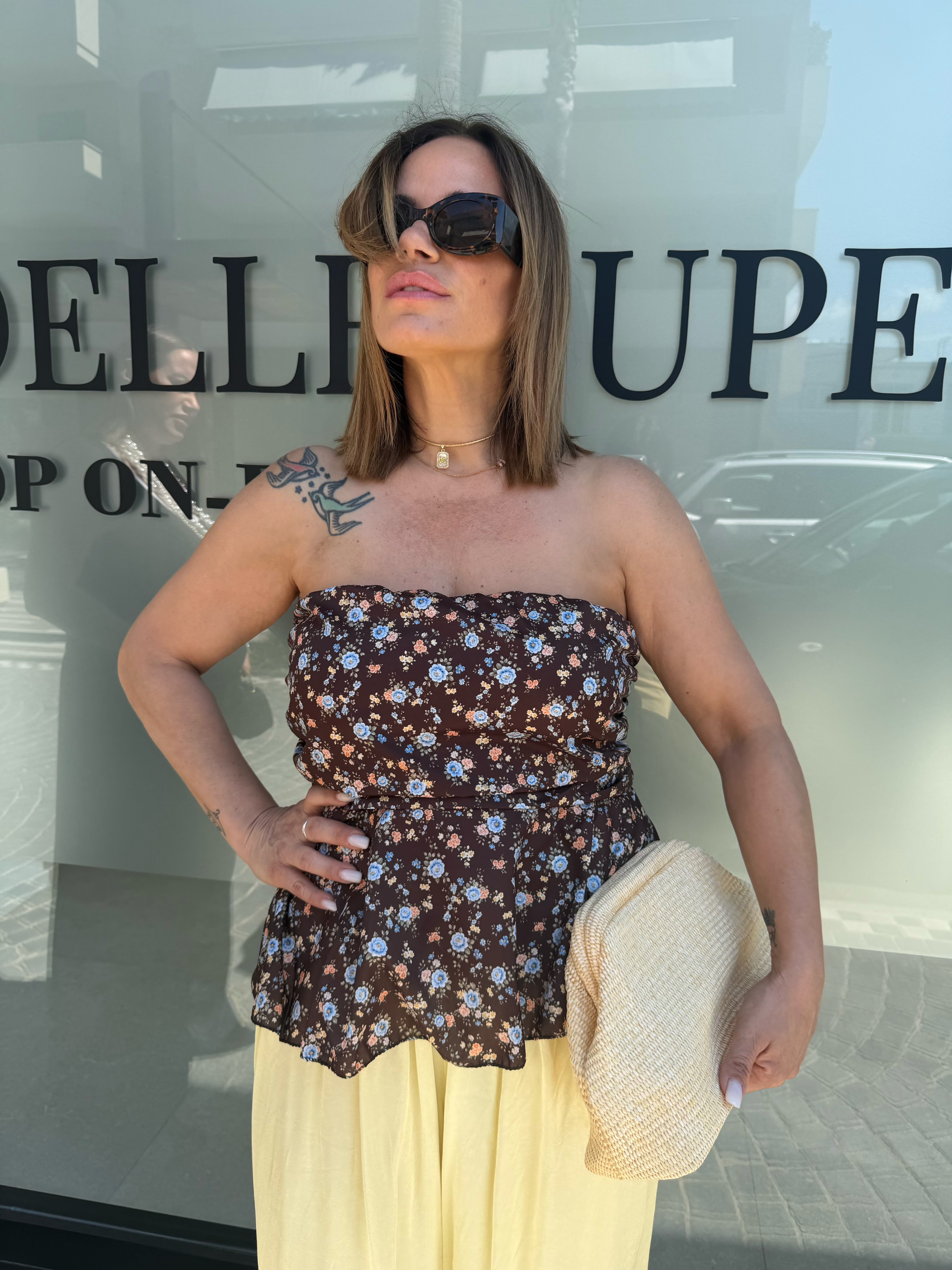 Top a fascia con fiorellini curvy