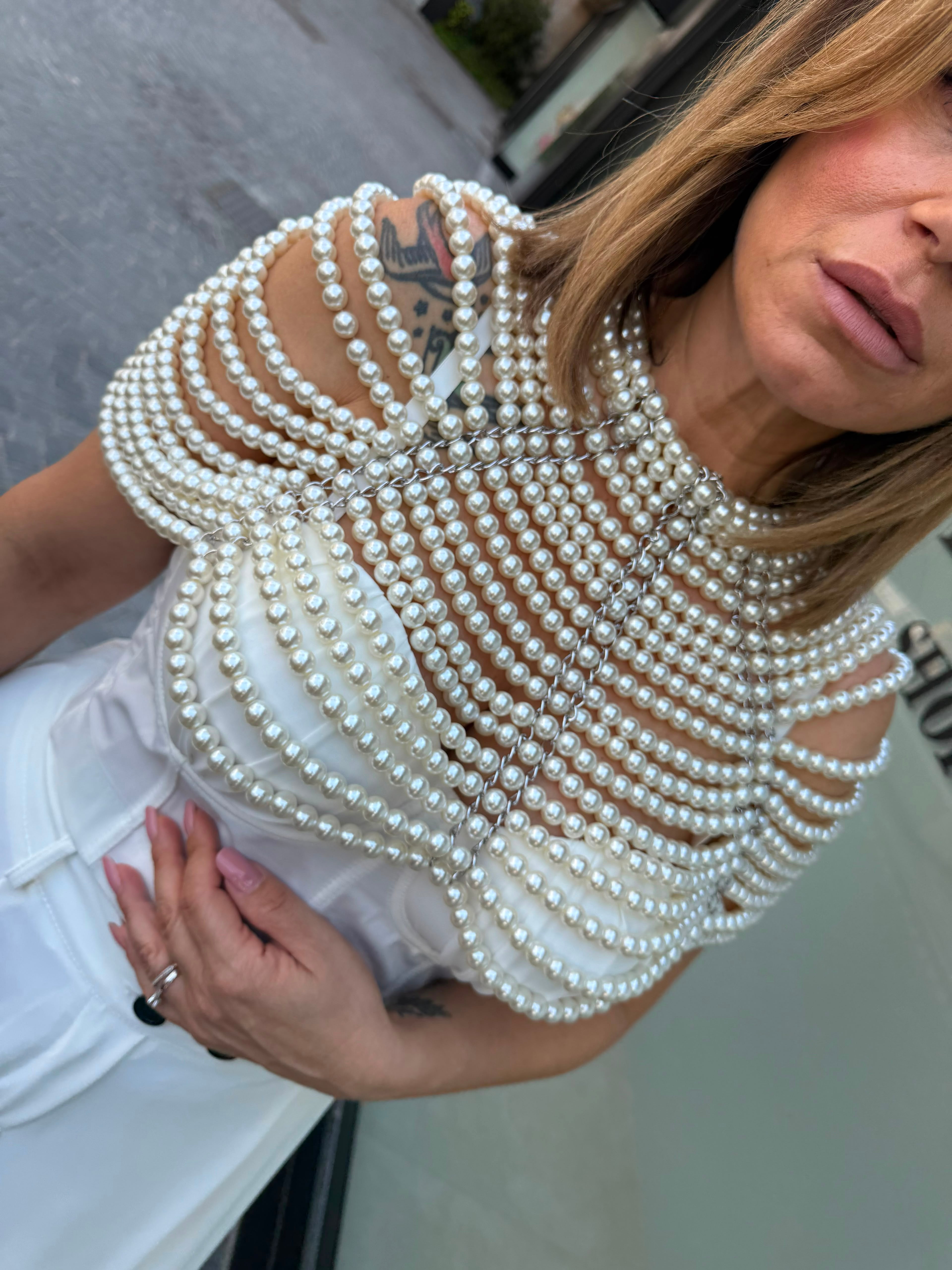 Copri braccia in perle