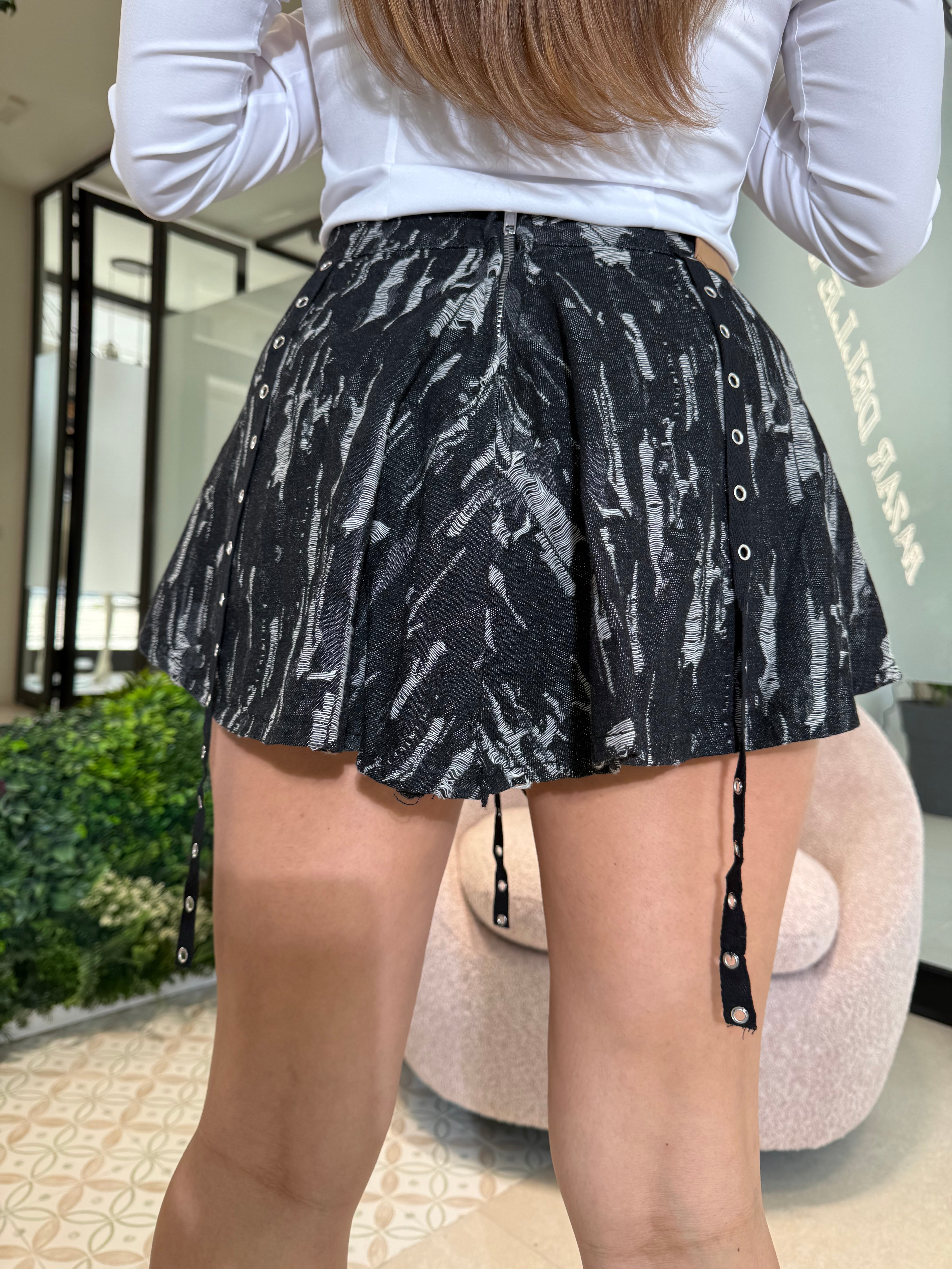 Pantagonna in denim sfrangiata