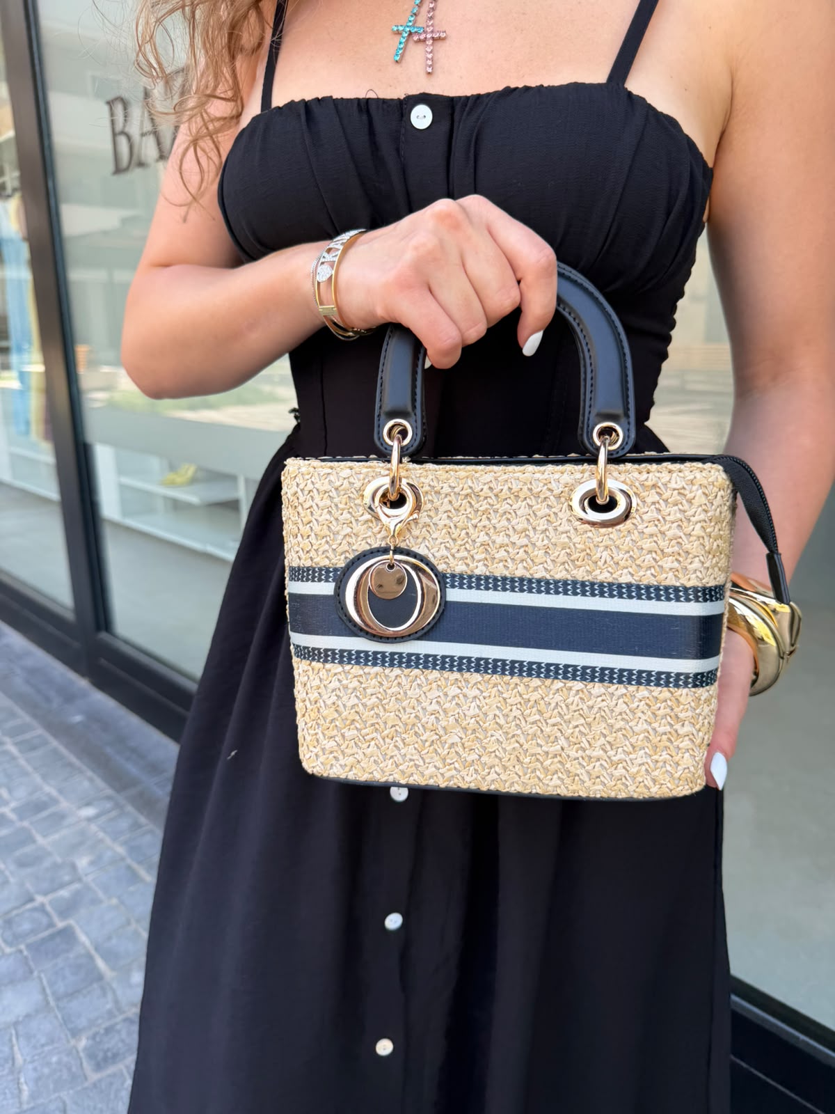 Borsa quadrata con manico in pelle