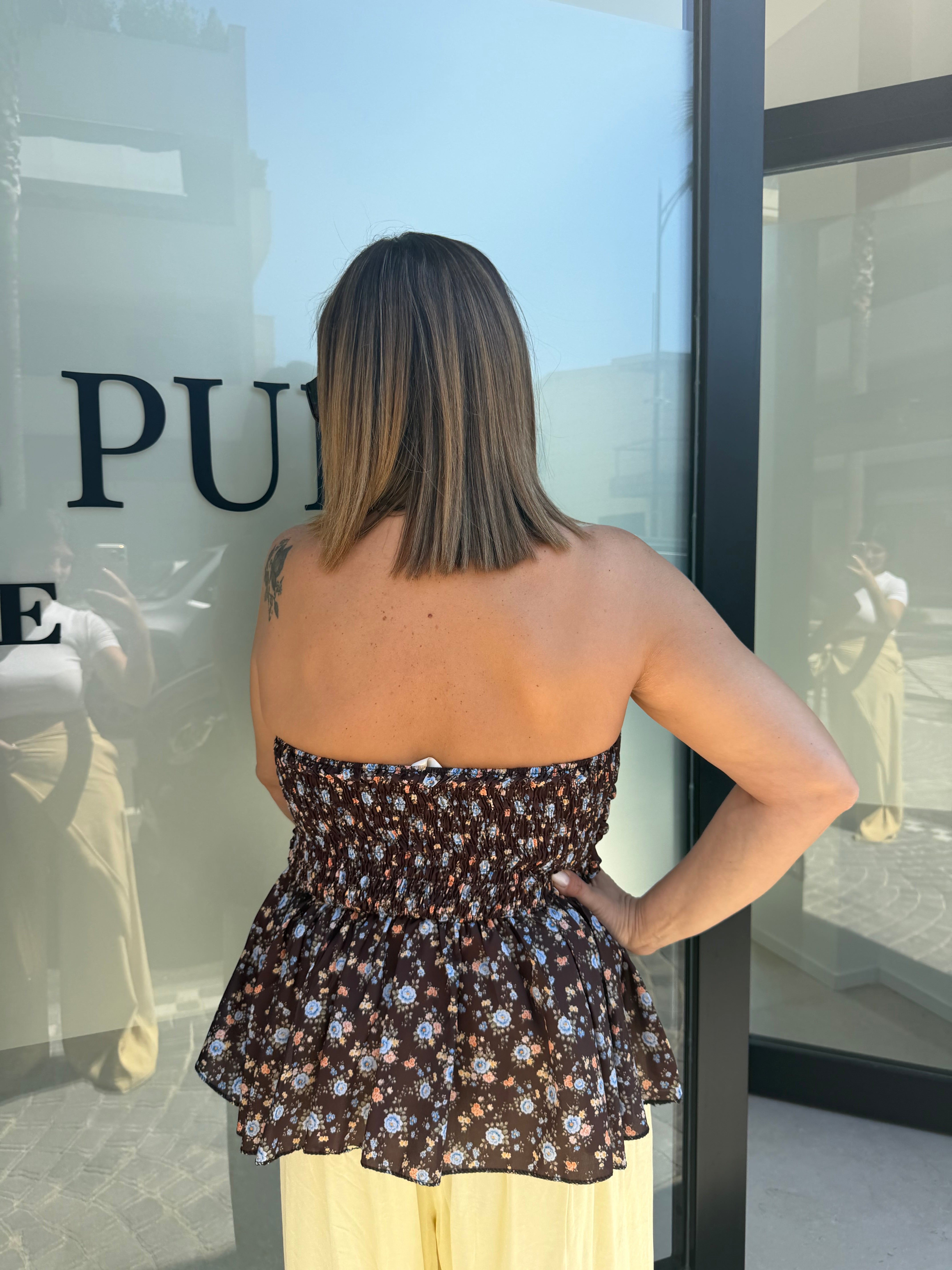 Top a fascia con fiorellini curvy