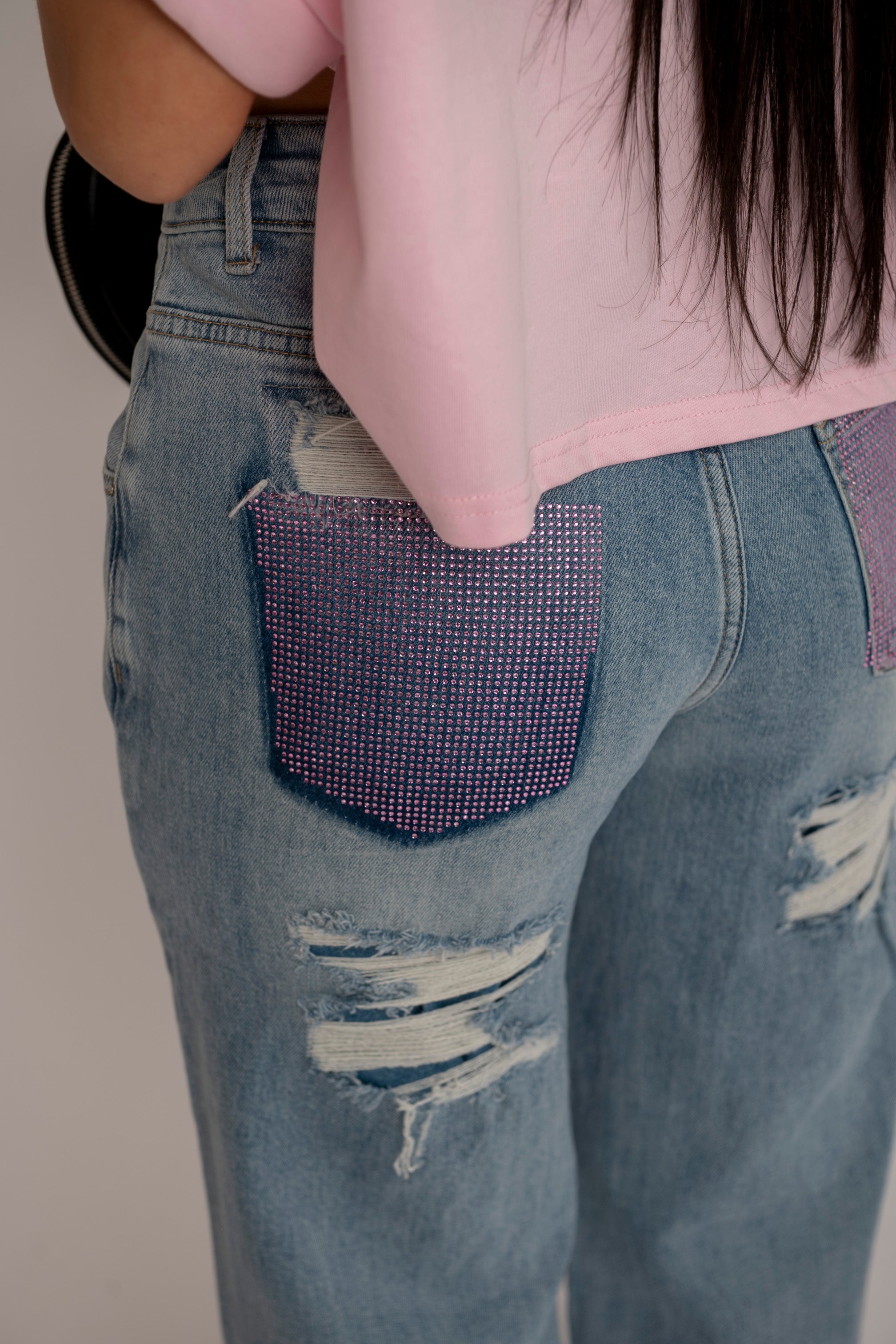 Jeans con tasca strass pink