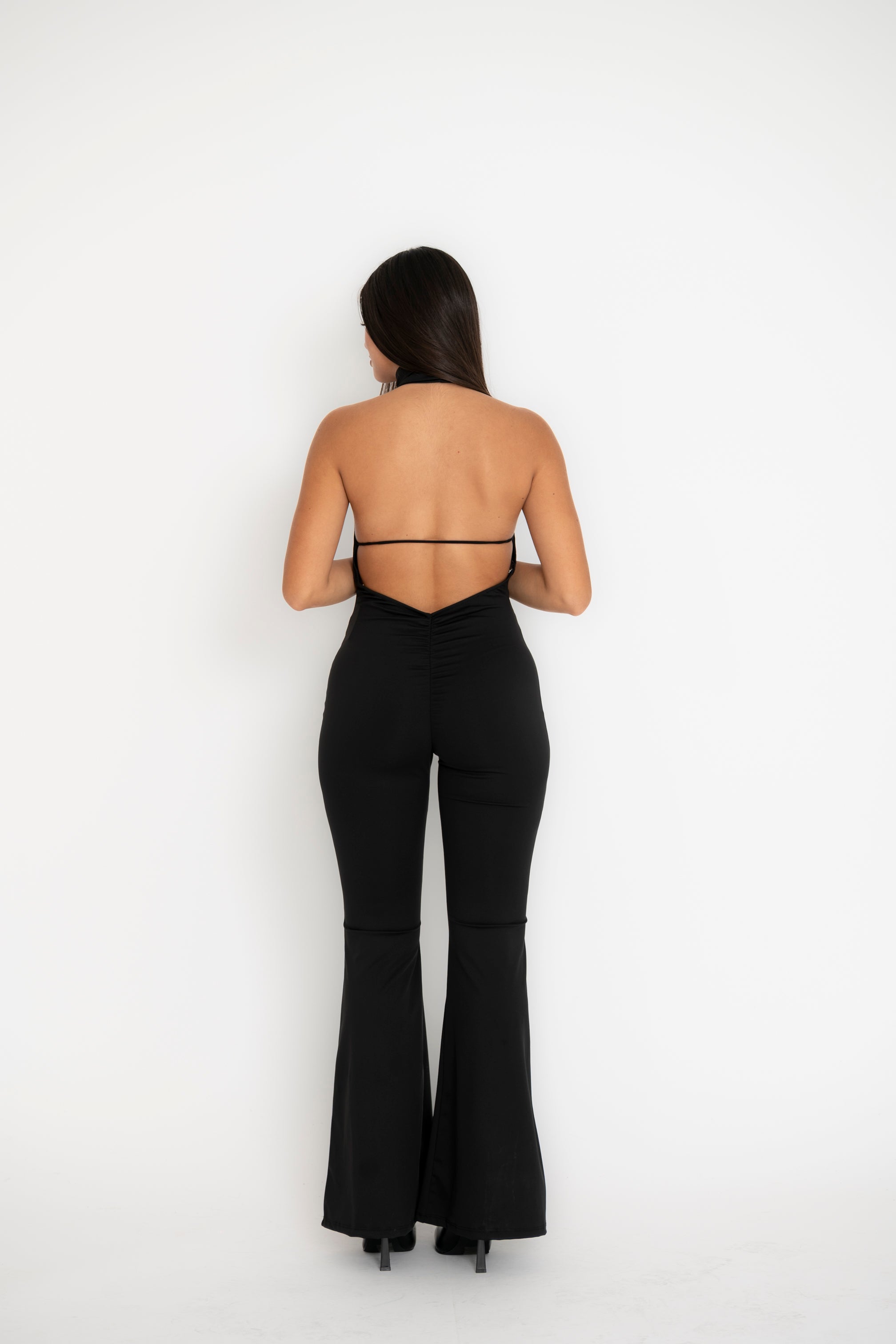 Tuta intera scollata al retro