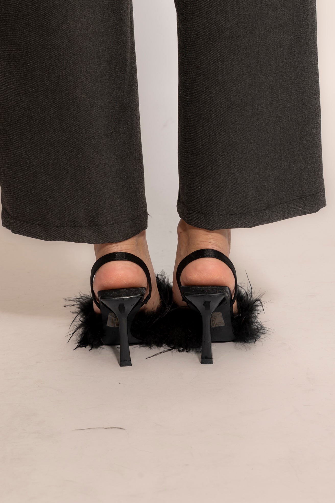 Décolleté con piume