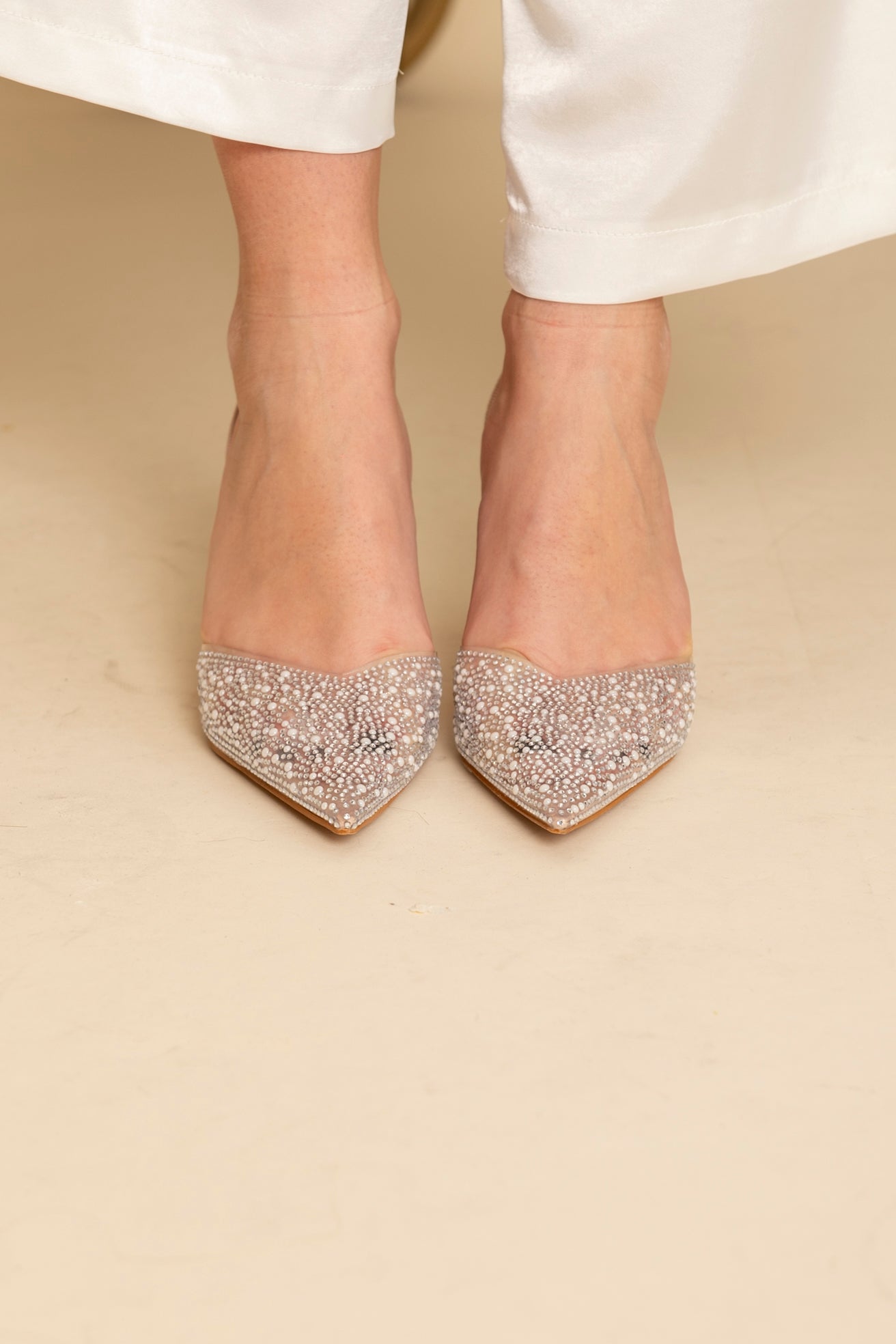 Décolleté con perline