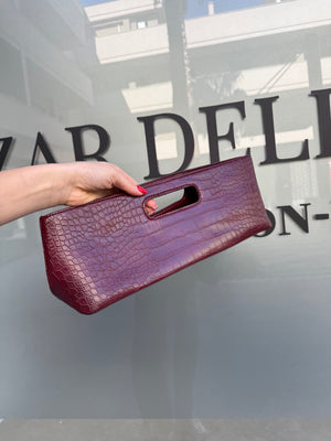 Pochette rettangolare con manico pitonato