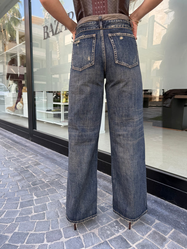 Jeans sabbiato con risvolto