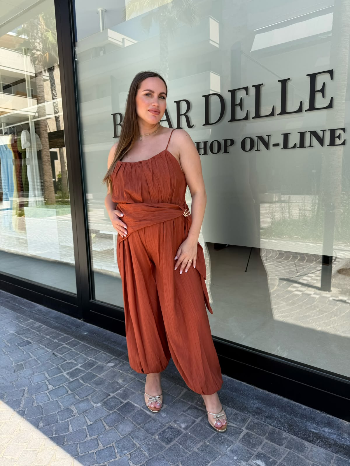 Tuta intera con dettaglio gold