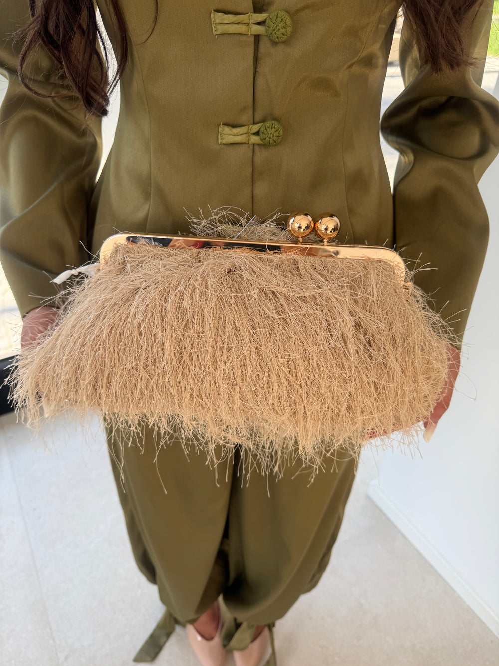 Borsa effetto piume