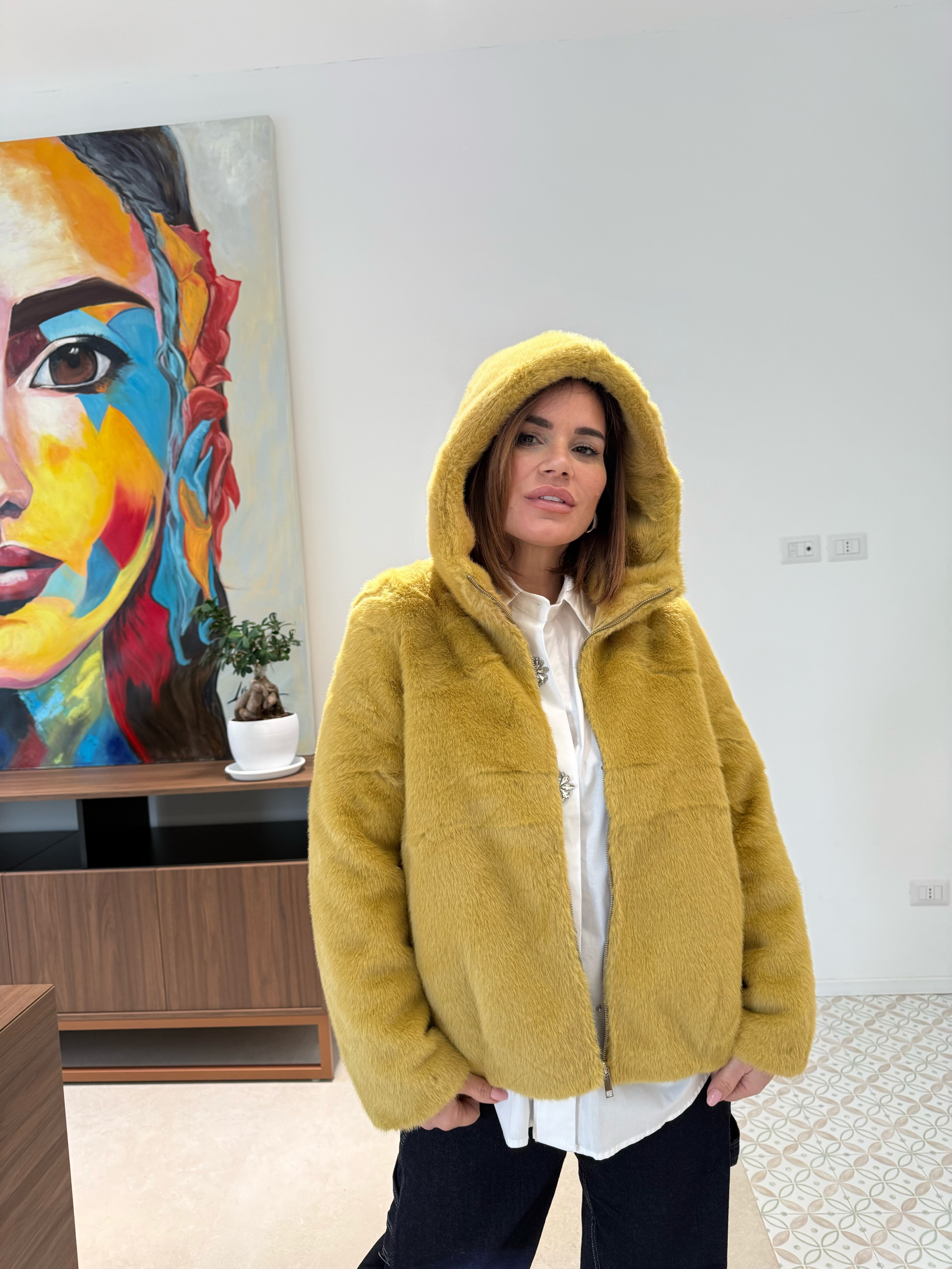 Pelliccia con cappuccio