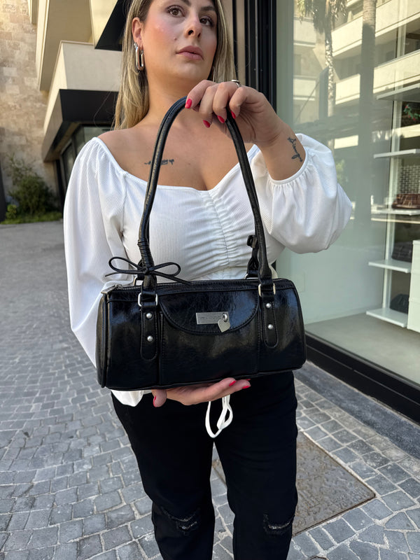 Borsa ovale in ecopelle