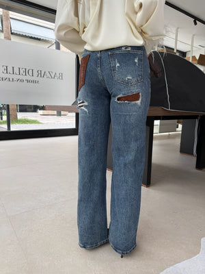 Jeans con tasca strass