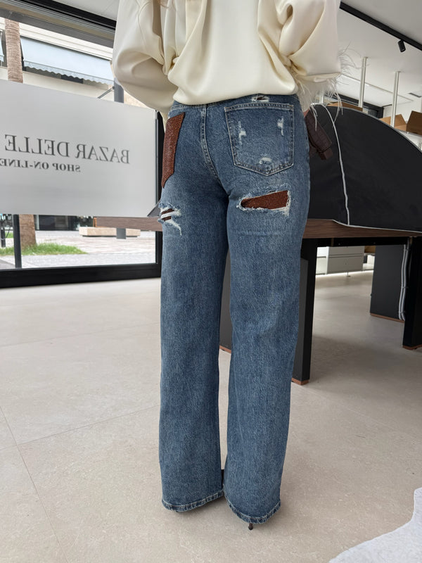 Jeans con tasca strass