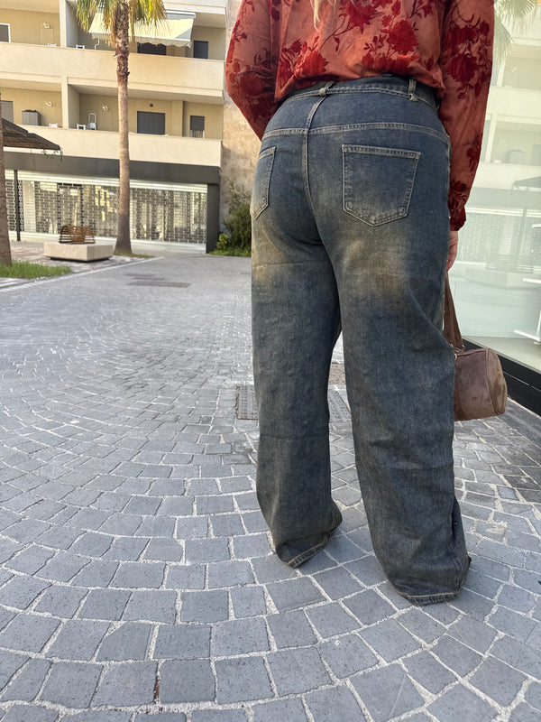 Jeans con punti luce gold