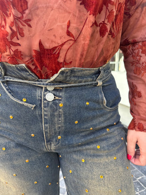 Jeans con punti luce gold