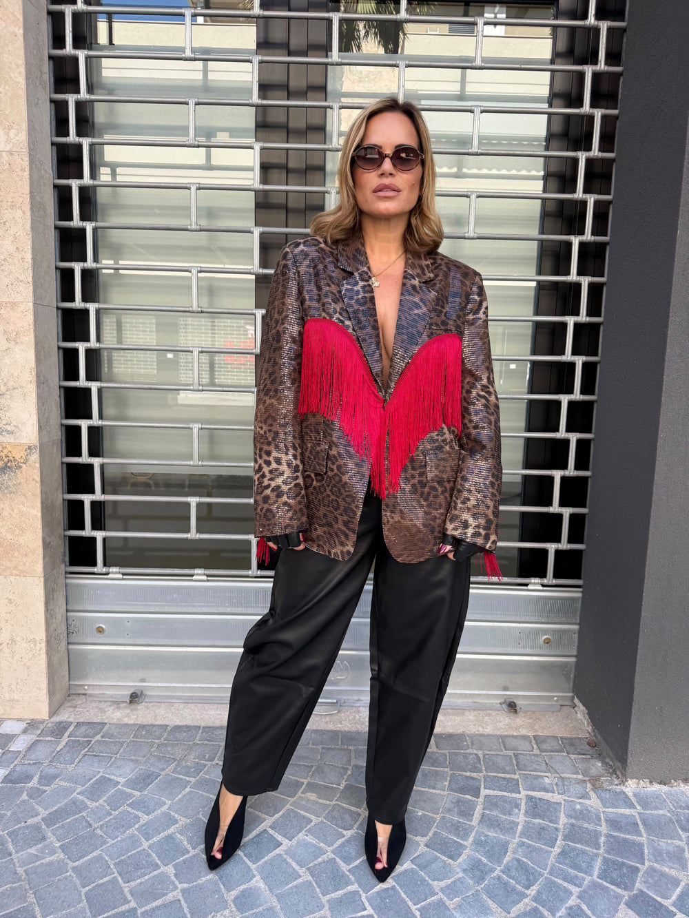 Giacca animalier in paillettes con frange