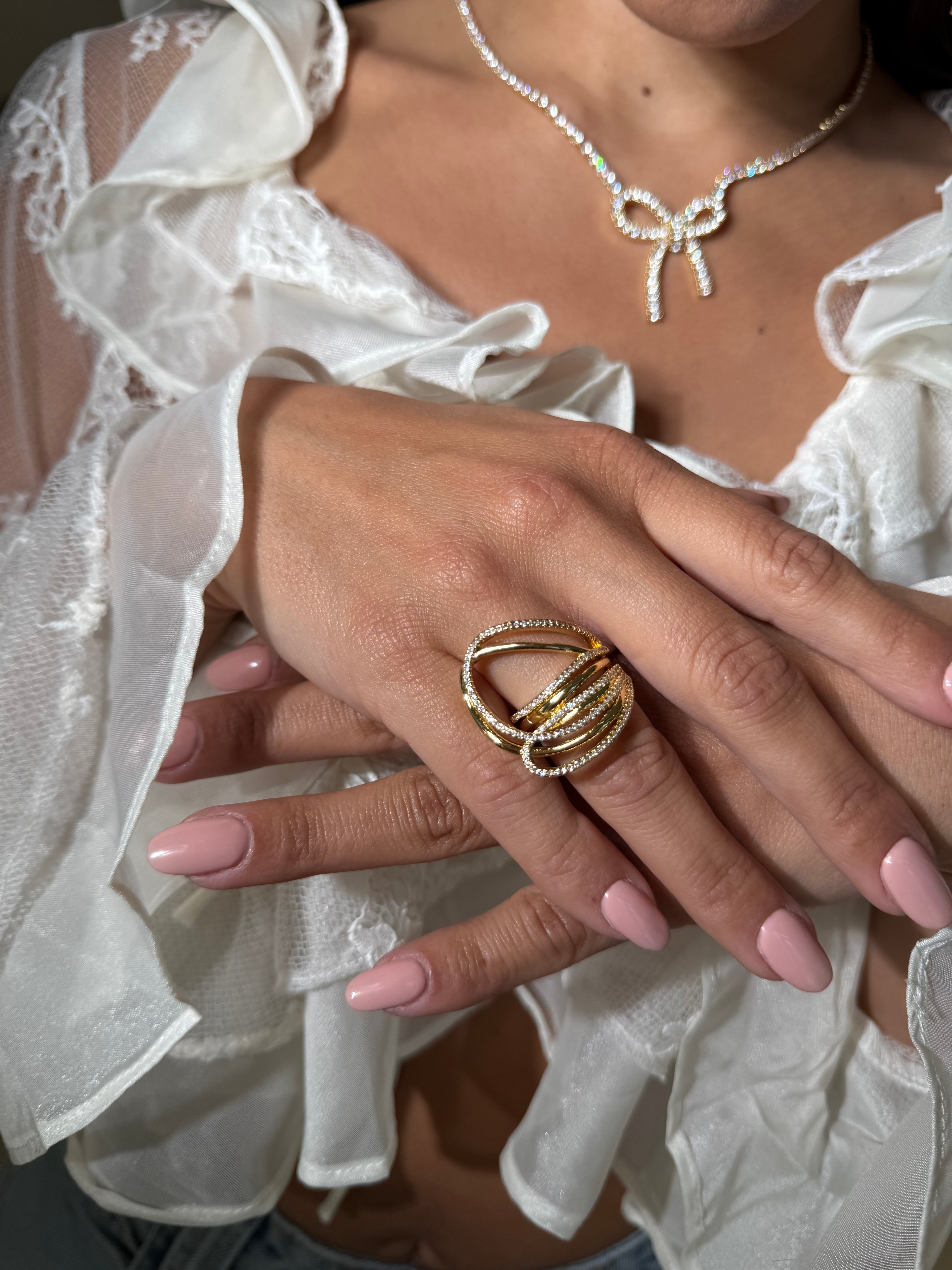 Anelli intrecciati strass