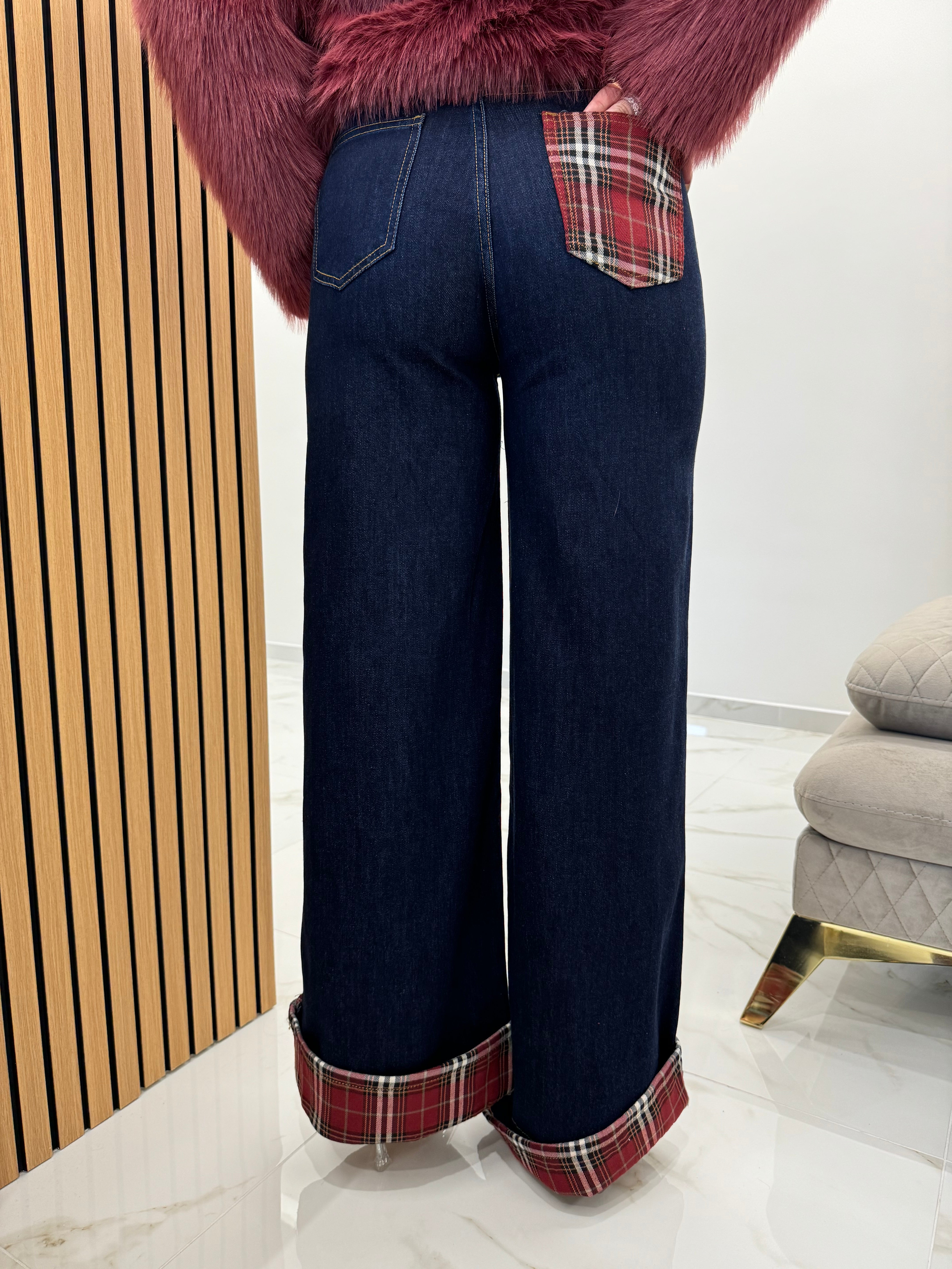 Jeans con piegone scozzese