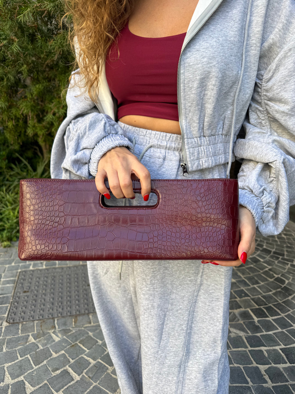 Pochette rettangolare con manico pitonato