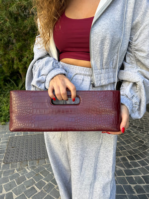 Pochette rettangolare con manico pitonato