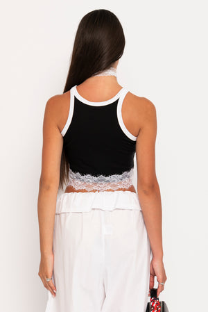 Top crop con dettagli in pizzo