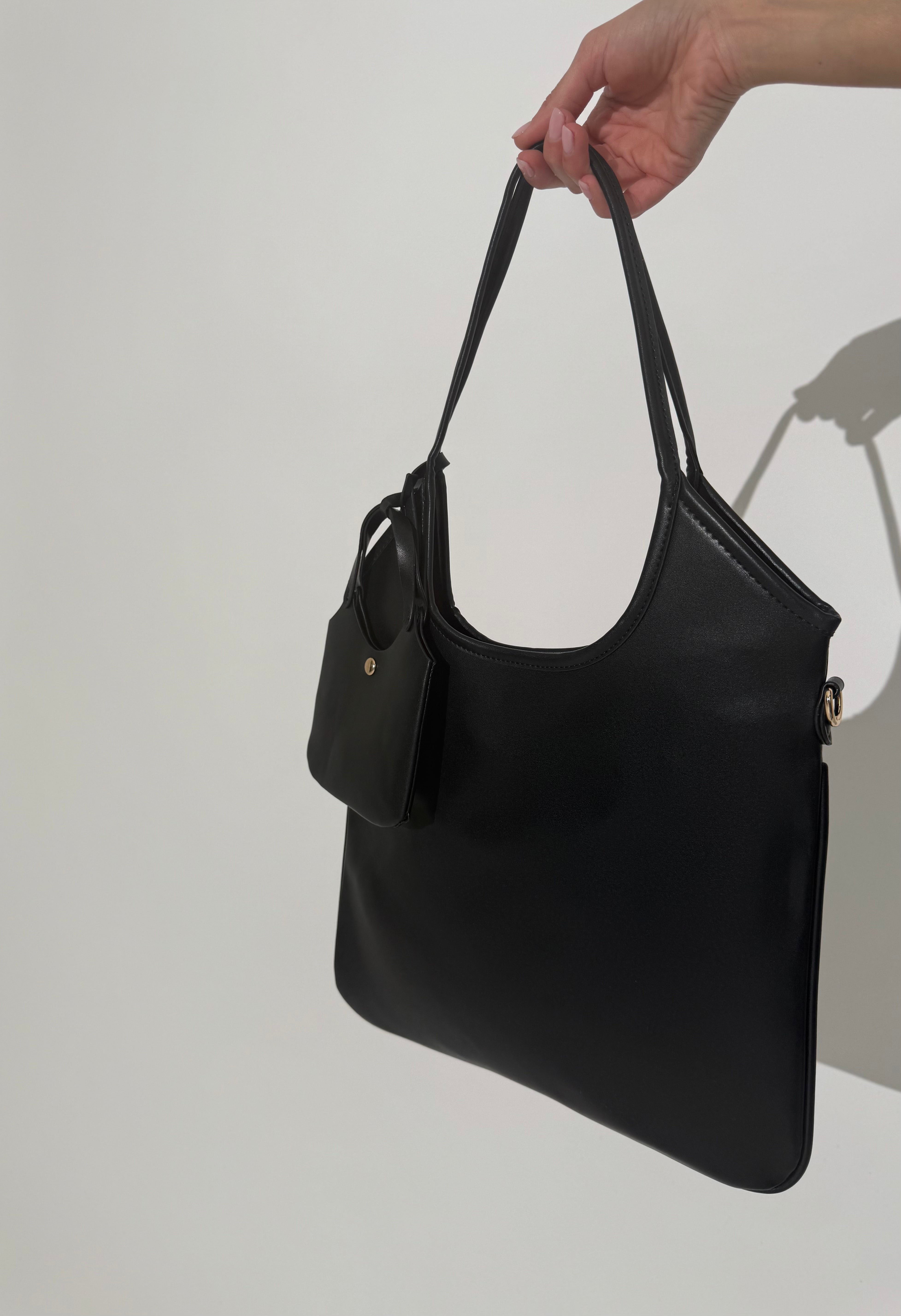 Borsa in ecopelle con mini bag