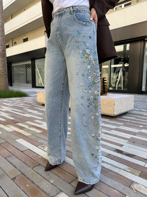 Jeans fiori strass
