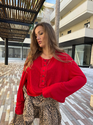 Maglia crop semitrasparente con bottoncini