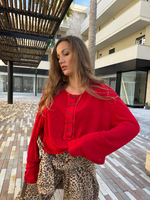Maglia crop semitrasparente con bottoncini
