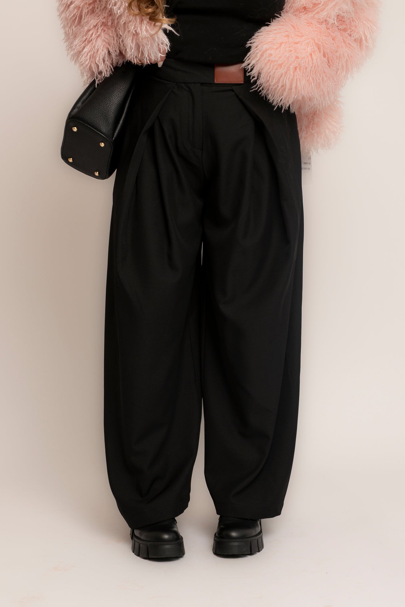 Pantalone palazzo con pence