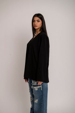Long sleeve scollo a V
