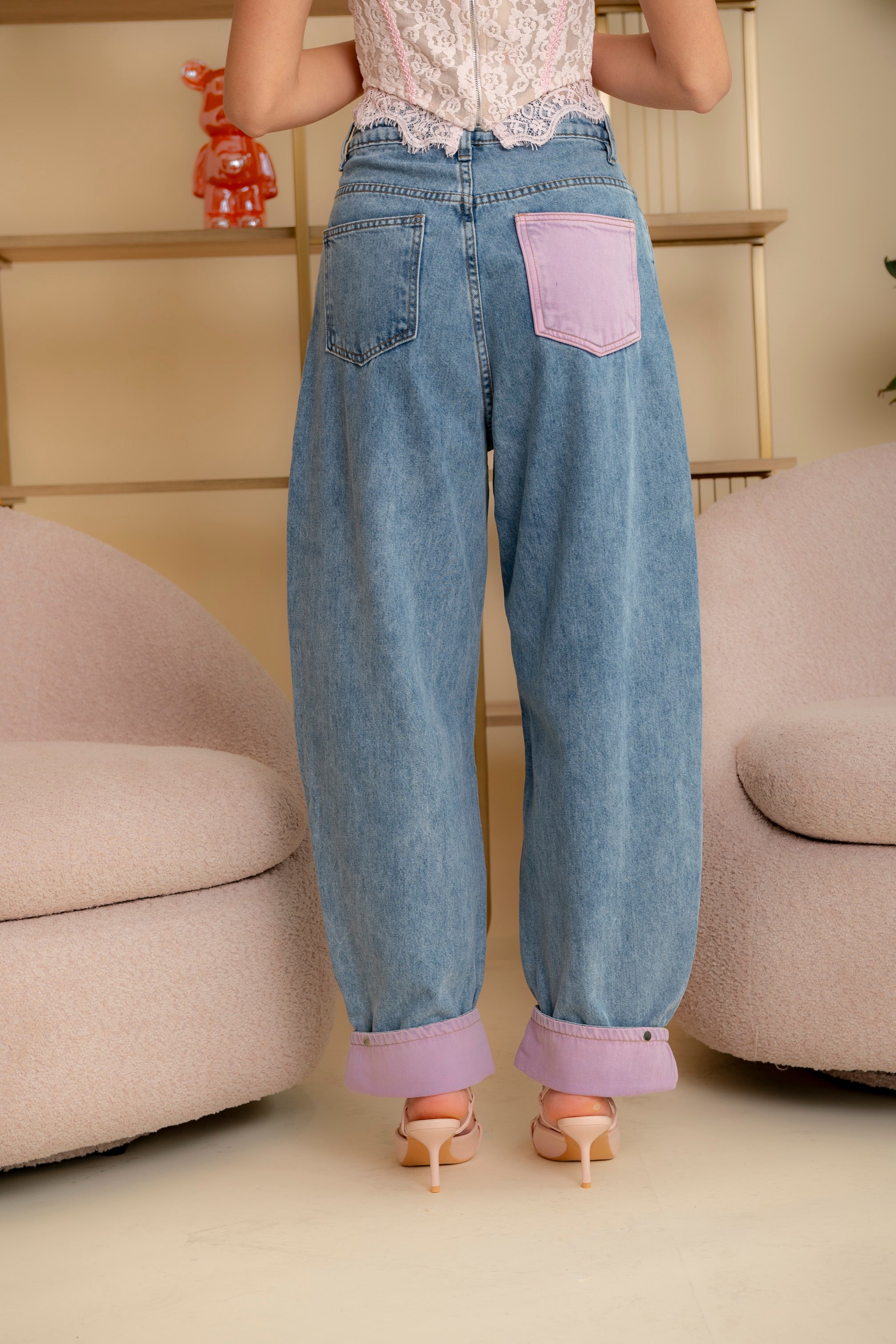 Jeans con risvolto lilla