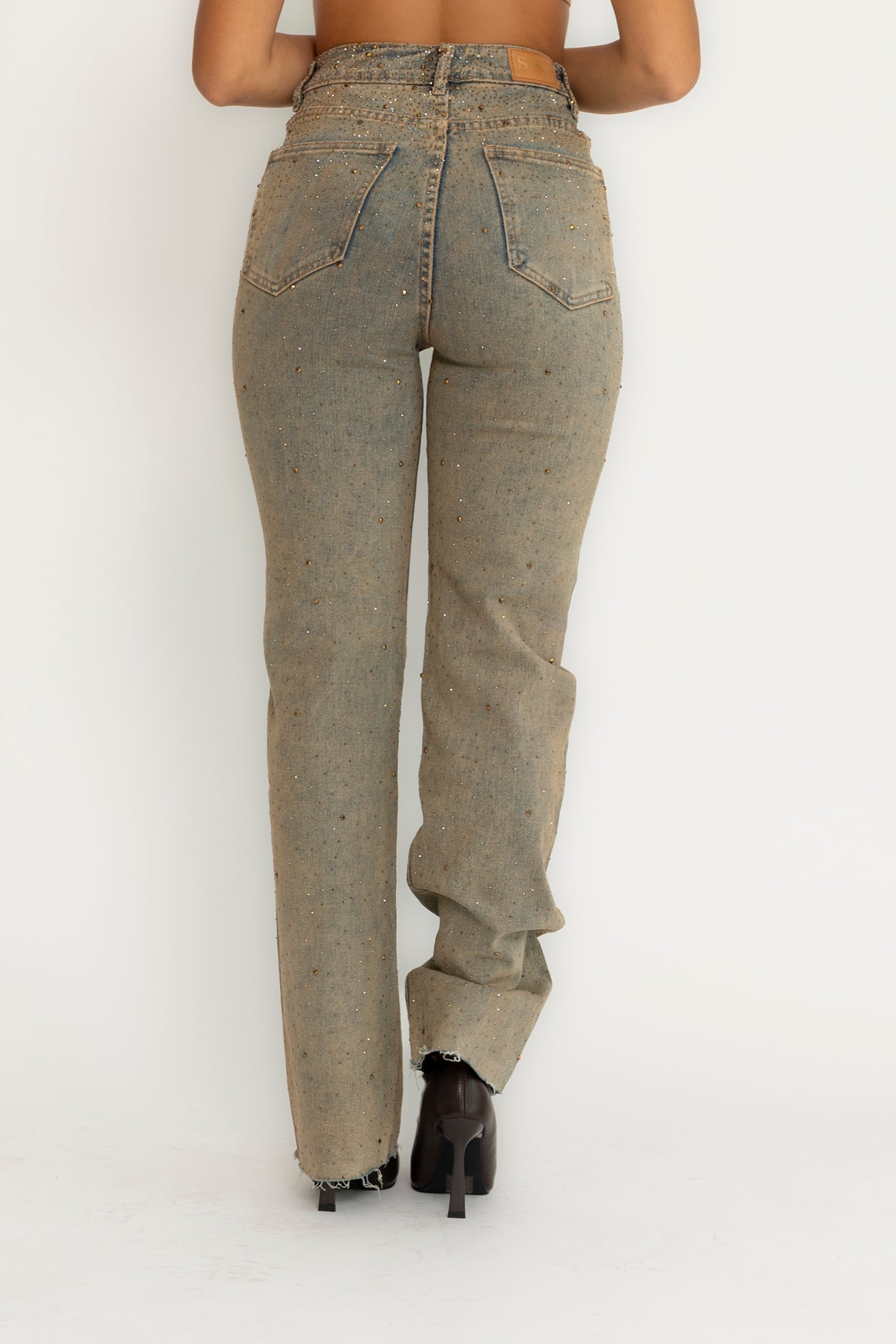 Jeans sabbiato con strass gold