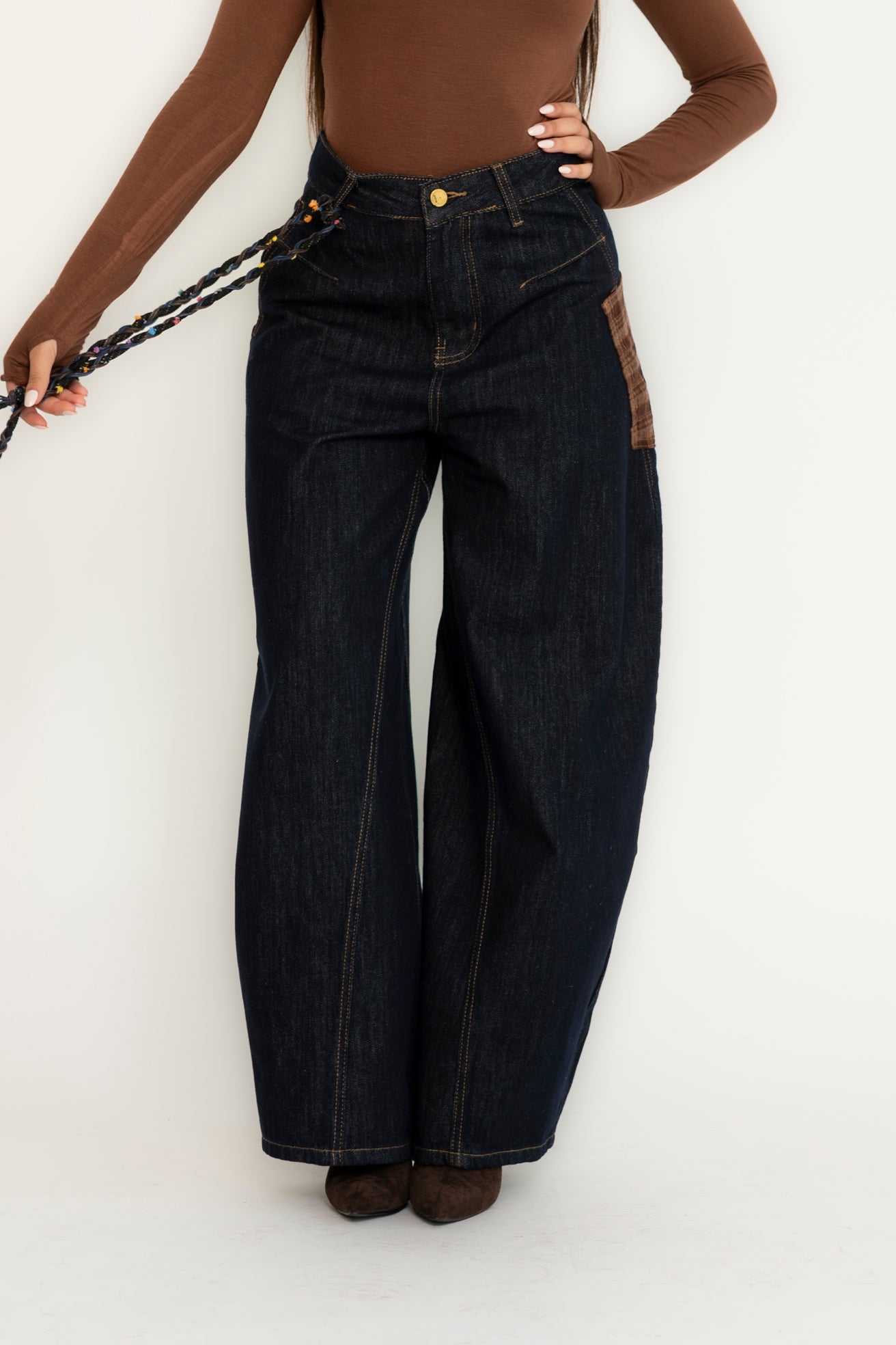 Jeans ballon con tasconi a quadri