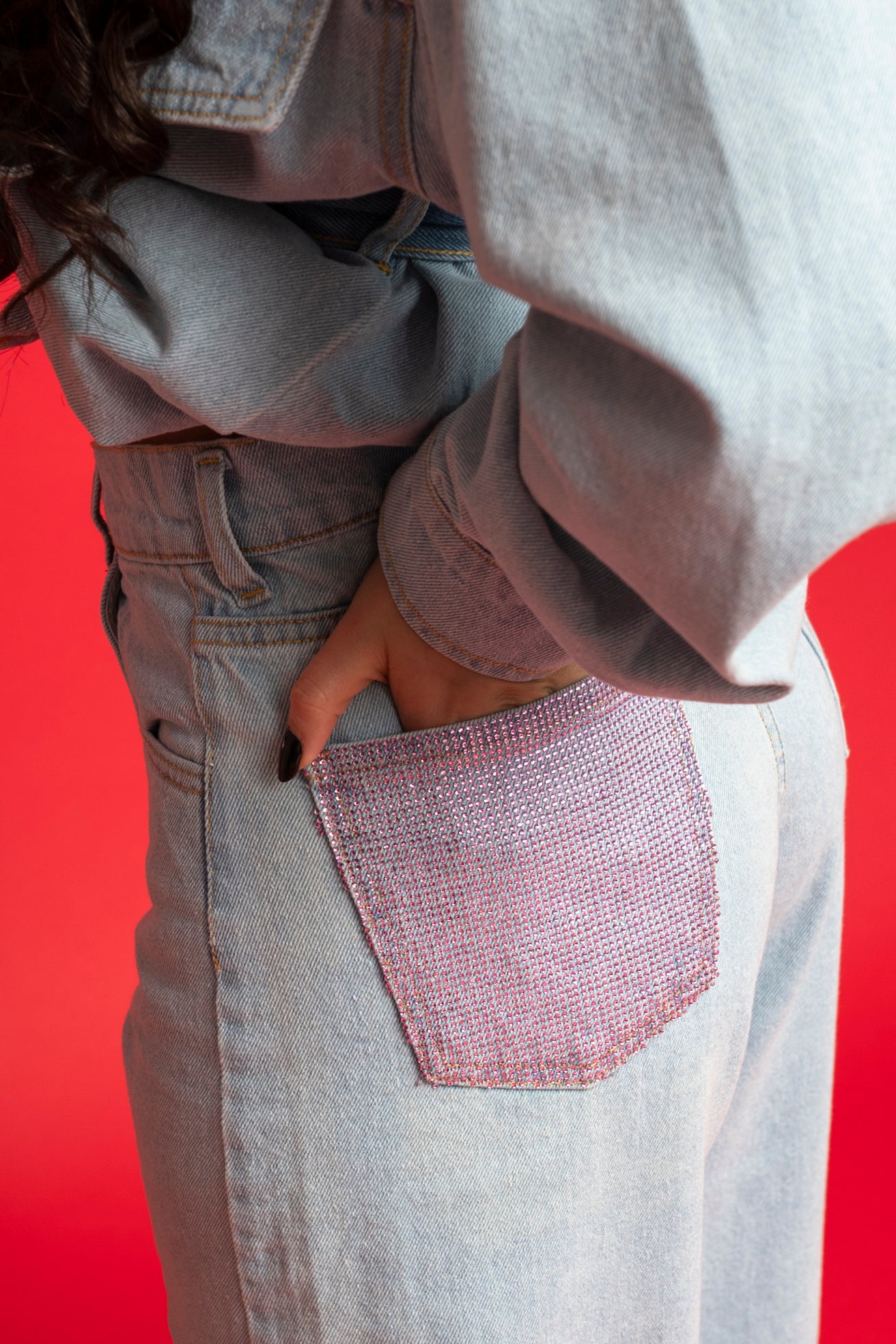 Jeans tasca rosa con risvolto