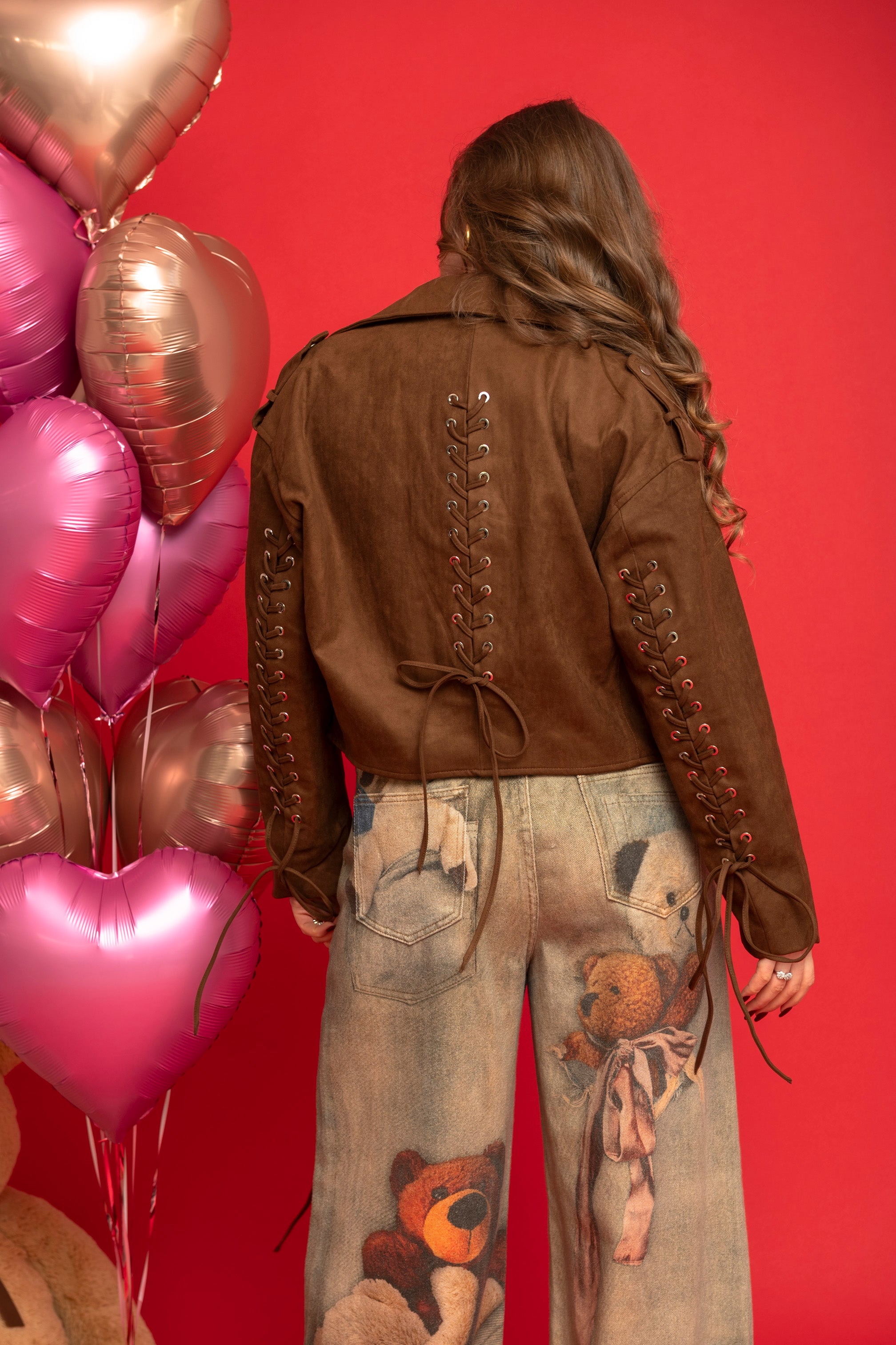 Giacca in camoscio con stringhe