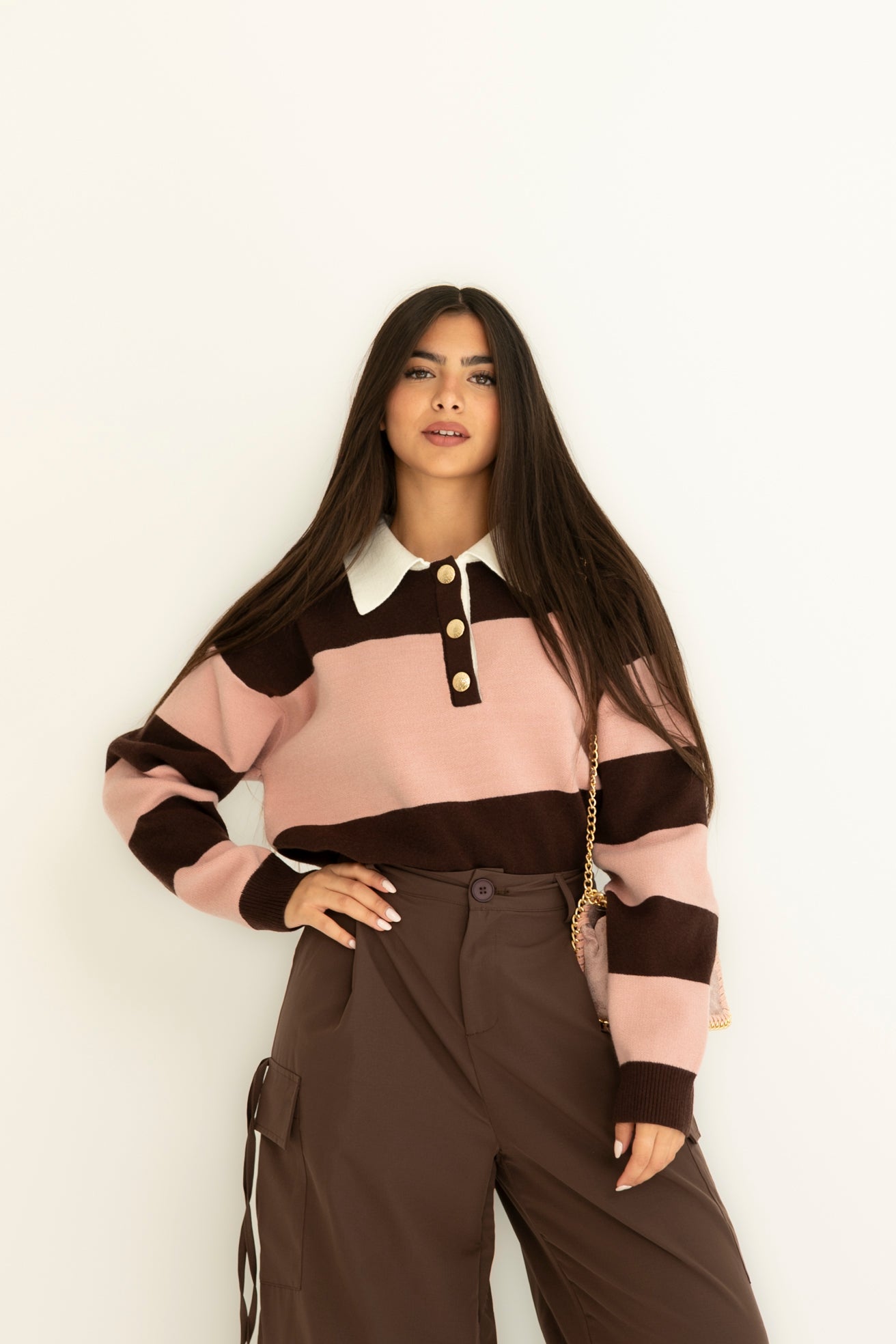 Polo con bottoni oro