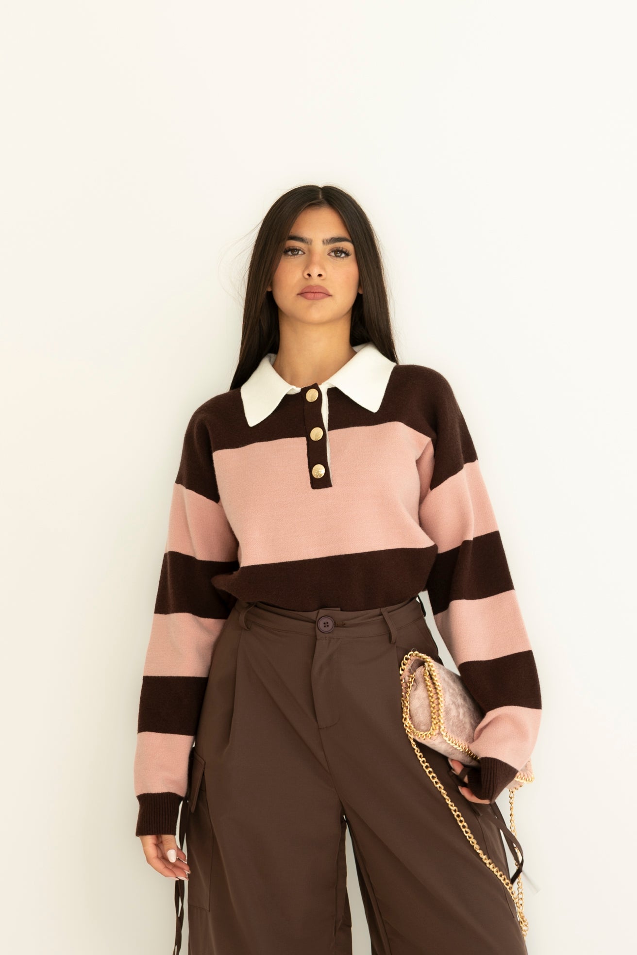 Polo con bottoni oro