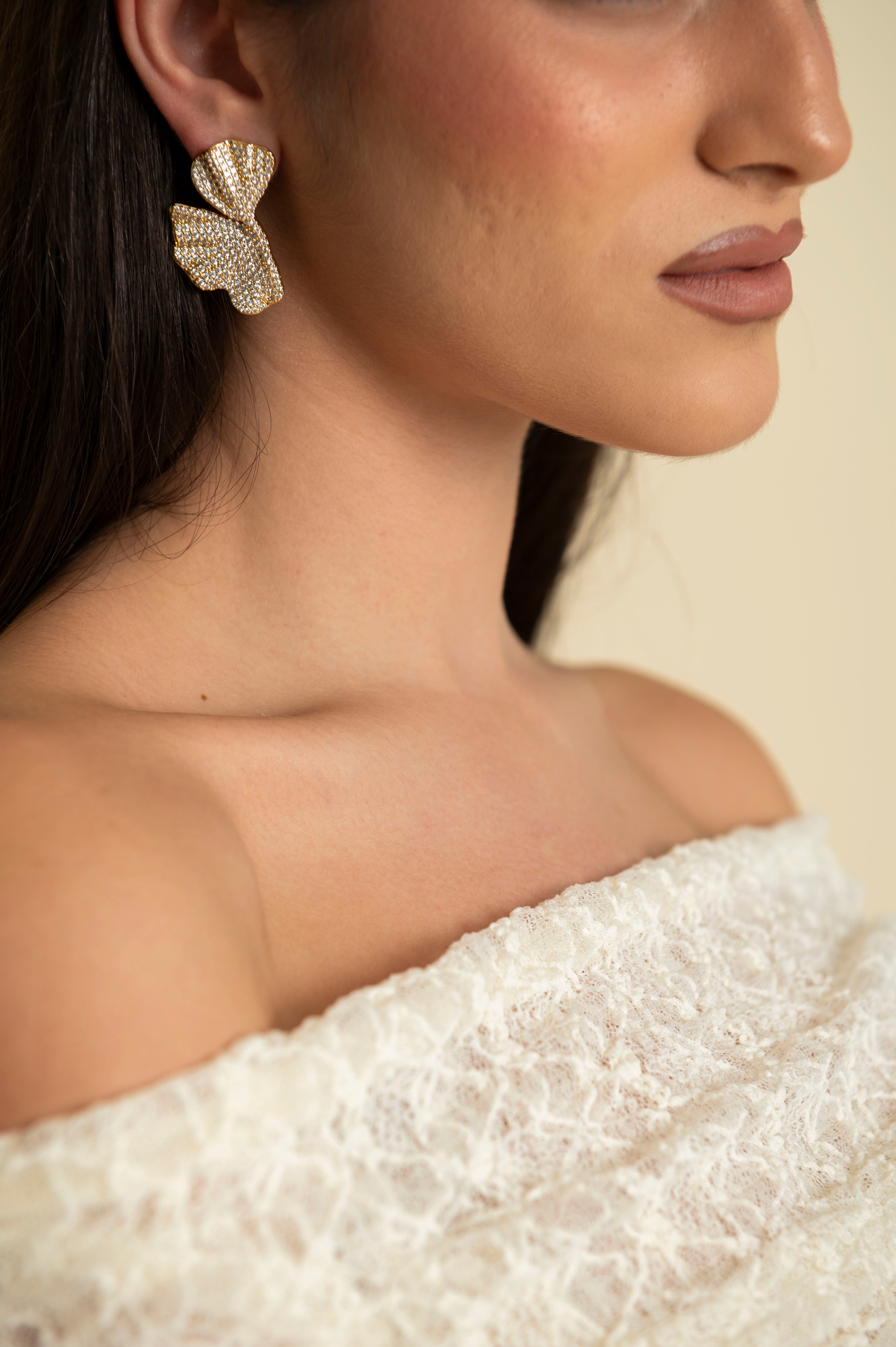 Orecchini metà fiore strass