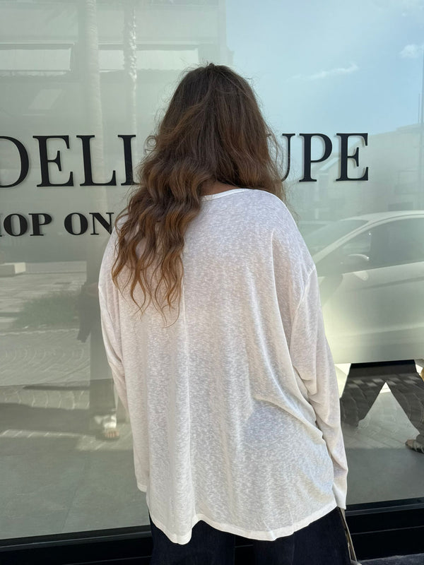 Maglia trasparente bottoni