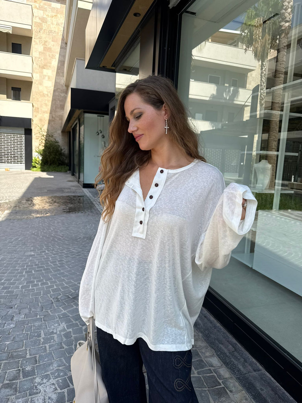 Maglia trasparente bottoni