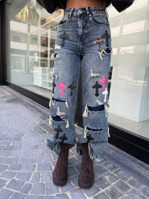 Jeans con croci
