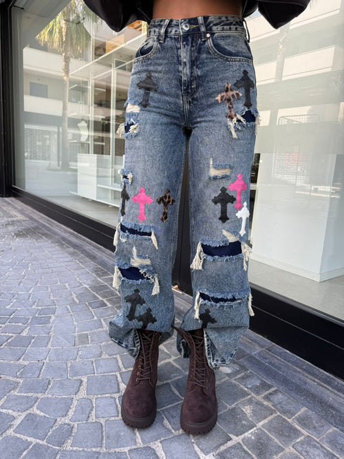 Jeans con croci
