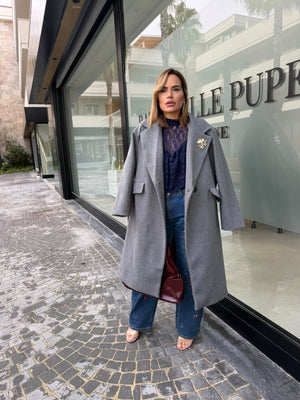 Cappotto in panno con spilla curvy