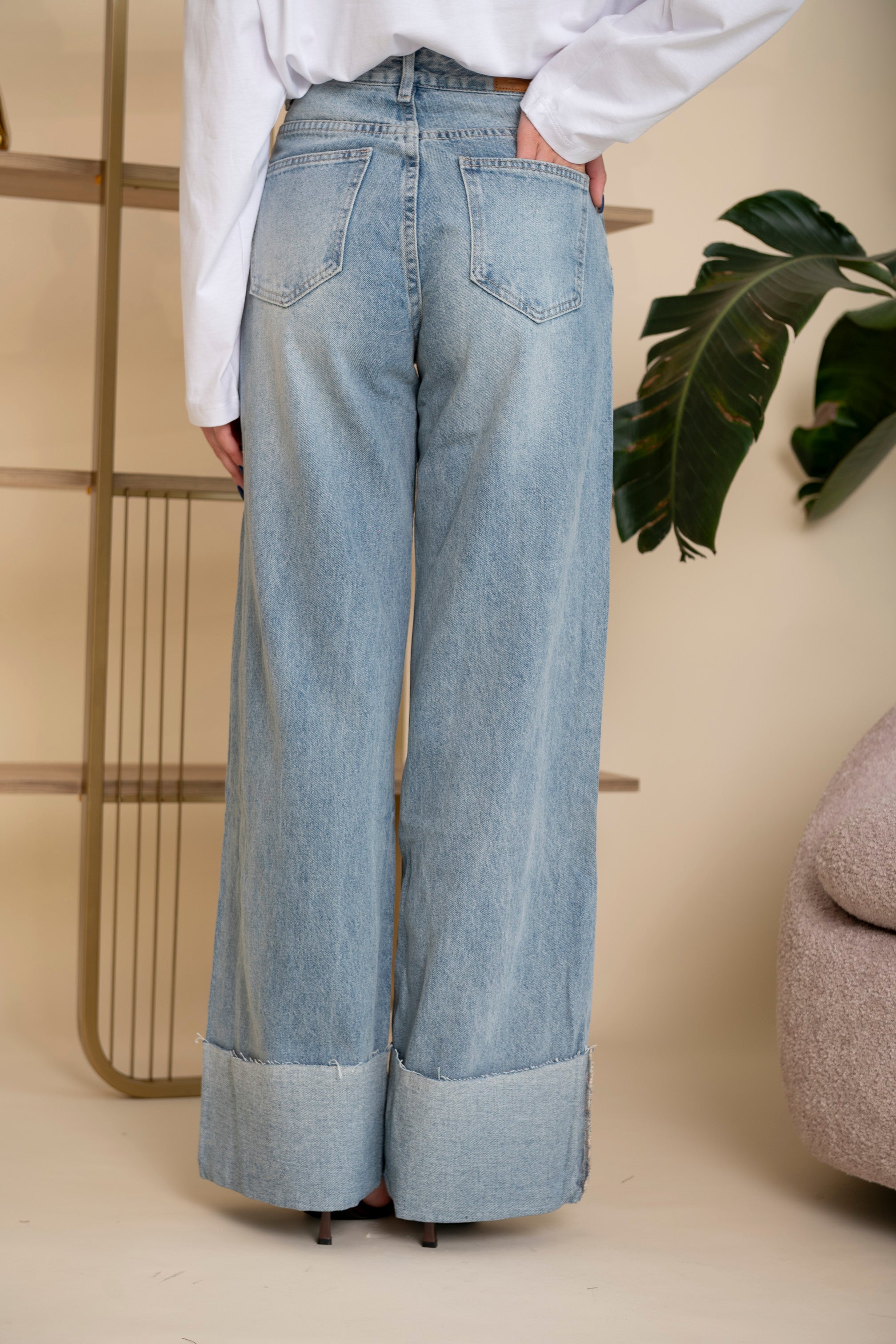 Jeans palazzo con piegone