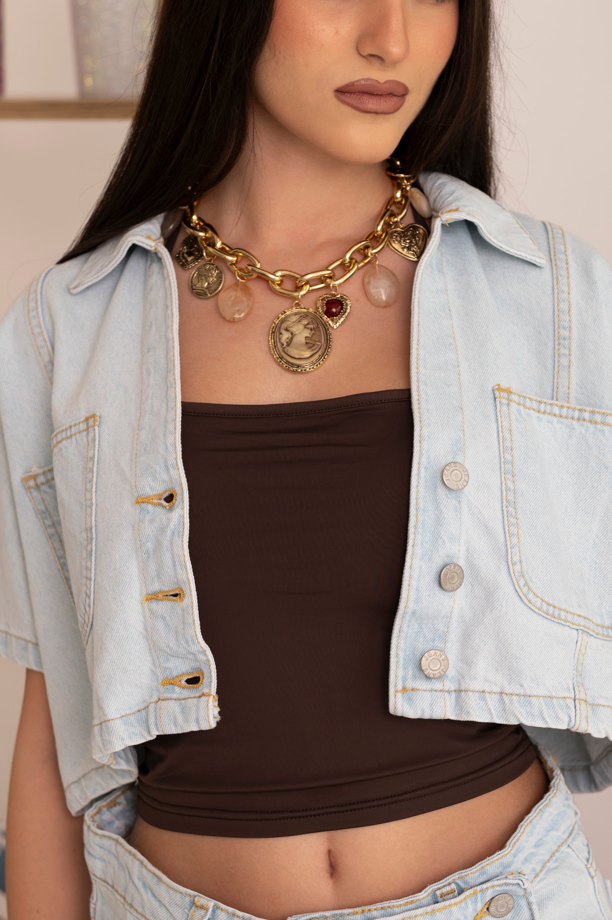 Collana ciondoli e monete