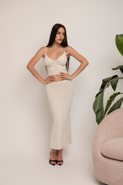 Cordset top a triangolo e gonna tubino midi